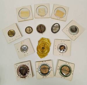lot 142 image: Vintage Assortment of Collectors Pins and Stamps Including Shirley Temple and More