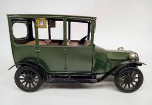 lot 150 image: Vintage Tin Litho Toy Ford by BANDAI
