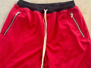 lot 38 image: Fear of God Red Mesh Drop Shorts 5th Collection