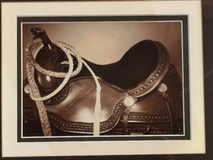 lot 128 image: Framed Black and White Saddle Photograph