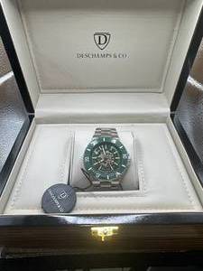 lot 6 image: Brand New Deschamps & Co. Skeleton Dial Ceramic Bezel Watch $1081.00 Retail