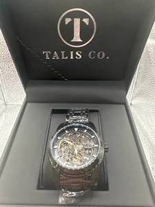 lot 7 image: Talis Black Skeleton 7820 Watch $749 Retail