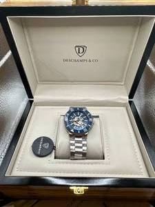 lot 15 image: Brand New Deschamps & Co. Silver Blue Textured Dial Watch $788 Retail