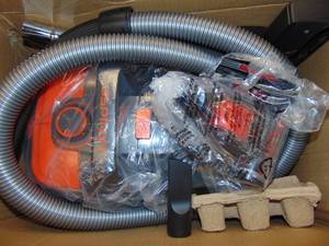 lot 37 image: Canister Vacuum