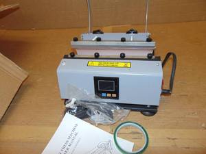 lot 33 image: Tumbler Press Mug Press