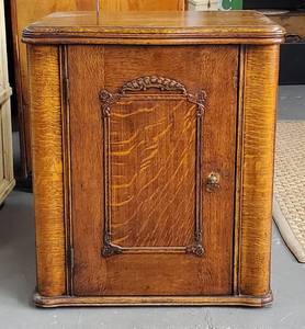Antique Sewing Machine in Oak Cabinet