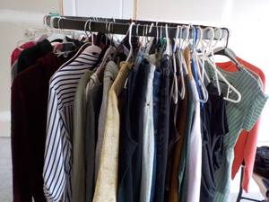 lot 1 image: Rack Full of Name Brand Clothing- all sizes like new -(rack not included)