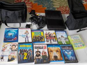 lot 8 image: 2 LG Car DV Players and DVDs...