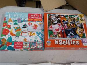 lot 212 image: 2 New Puzzles...