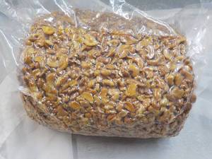 lot 273 image: 12 12 lb. Bag Honey Roasted Cashews Halves and Pieces