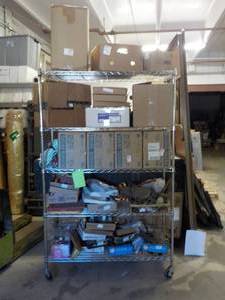 lot 340 image: Everything pictured of unsold and unclaimed inventory Shelving unit is not included