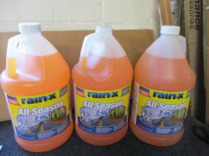 lot 103 image: All Season Rain - X, 3 Bottles...