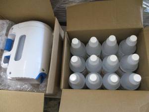 lot 108 image: Ecolab Detergent and 12 Bottles of Sanitizer