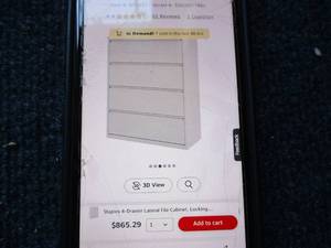 lot 117 image: Staples 4 Drawer 42 File Cabinet- retail $865