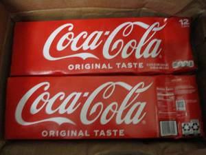 lot 125 image: Coco Cola 24 cans...