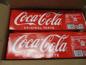 lot 142 image: Coco Cola 24 cans...