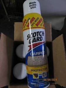 lot 8 image: A case of four 17oz Scotch gard carpet and rug protecter
