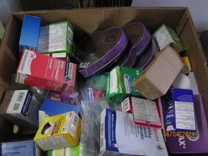 lot 25 image: box of candy and medicine...