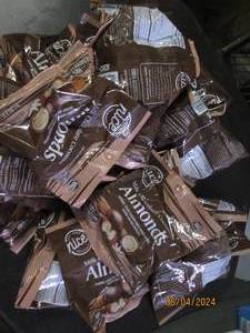 lot 26 image: 22 bags of milk chocolate coconut almonds 11102024