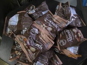 lot 28 image: 22 bags of milk chocolate coconut almonds 1110202