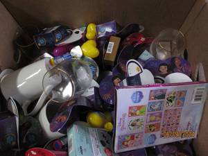 lot 30 image: box of candy , cups and stuffed animal in date