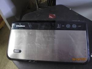 lot 31 image: foodsaver , helmet and seat covers...