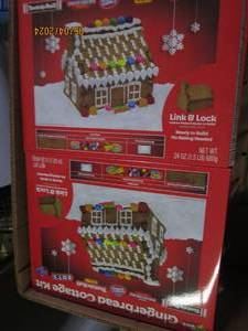 lot 34 image: 8 gingerbread cottage kits in date Best by 072024