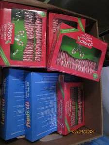 lot 39 image: box of in date candy canes and sugar cookie cottages Best by 08252024 and 022025