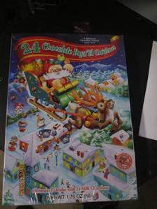 lot 40 image: 8 advent calanders best buy date of july 2025