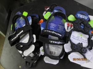 lot 47 image: 6 sets of ice cleats...