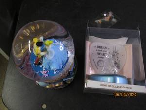 lot 48 image: snowglobe and light up glass figurine