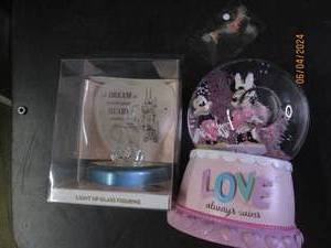 lot 49 image: snowglobe and light up glass figurine