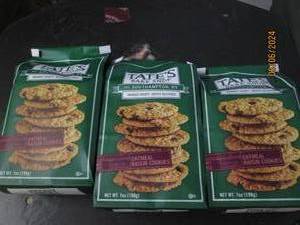 lot 75 image: 3 bags of tates bake shope oatmeal raisin cookies 7 oz bags best buy date of april 2024