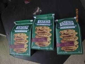 lot 77 image: 3 bags of tates bake shop oatmeal raisian cookies 7 oz bags best buy date of december 2023