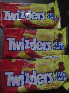 lot 135 image: 3 bags of twizzlers sweet and sour 11 oz bags best buy date of 42024