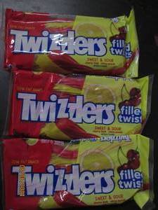 lot 136 image: 3 bags of twizzlers sweet and sour 11 oz bags best buy date of 42024