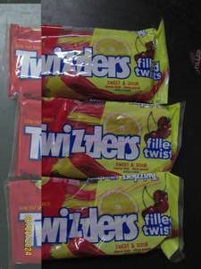 lot 137 image: 3 bags of twizzlers sweet and sour 11 oz bags best buy date of 42024