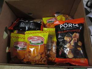 lot 181 image: 12 bagss of fried pork skins 2oz bags some in date some outdated Best by 06192024 and 12192023