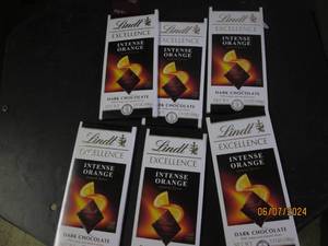 lot 191 image: 6 lindt intense orange candy bars best buy date of 32024