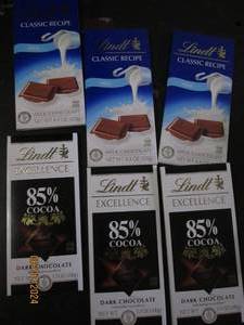 lot 196 image: 3 lindt classic recipe milk chocolate and 3 lindt coca candy bars past best buy date Best by 09302023 and 06302024