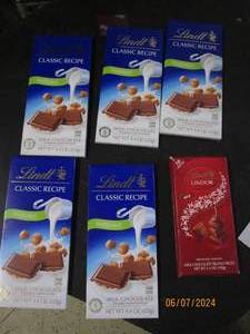 lot 199 image: 5 lindt candy bars and 1 lindt lindor candy bars past best buy date