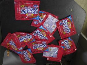 lot 264 image: 121.6 oz bags of razzles...