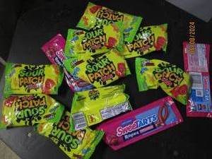 lot 279 image: varity of 12 packages of candy Best By 122023,01232024