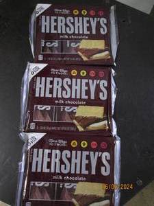 lot 292 image: 39.3 oz packages of hersheys milk chocolate 6 bars each package