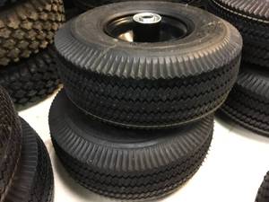 lot 122 image: Pair 4.103.50-4 Utility Wheels - Like New