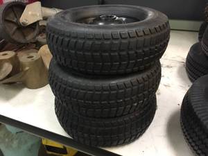 lot 125 image: 3 Hard Rubber Utility Wheels - Like New