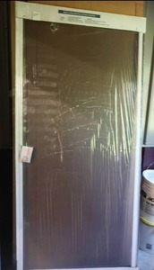 lot 28 image: NEW PATIO SCREEN DOOR JELD WEN