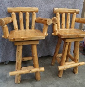 lot 104 image: 2 LOG BAR STOOLS