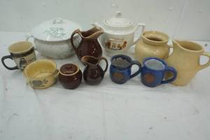 lot 45 image: Ceramic CreamSugars, two blue mugs, Have Faith Cup, Tea Pot, serving bowl with cover