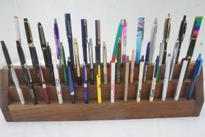 lot 96 image: Variety of Advertising Pens from area businesses and Pen Holder